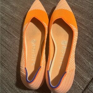 Rothy's The Point Orange Stripe flats.